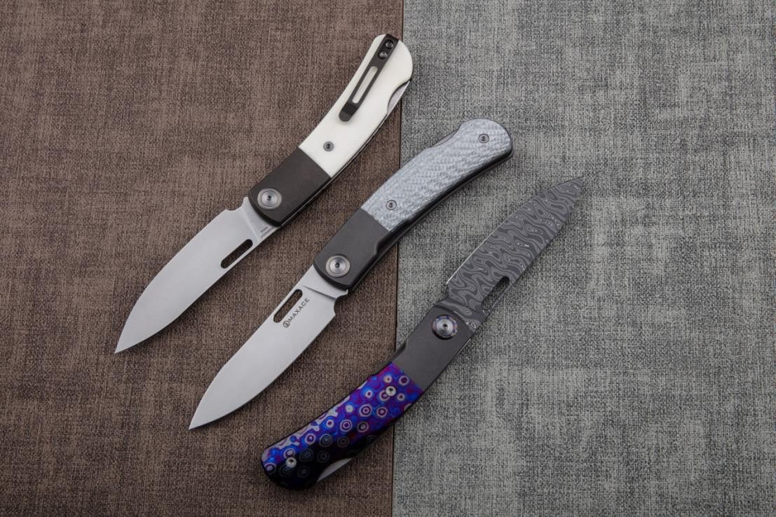 # ** COMING SOON ** MAXACE BEETLE 2.0 - MAGNACUT BLADE - SILVER CARBON FIBER - BONE ZIRCU-TI INLAYS - LOCK BACK - True Talon
