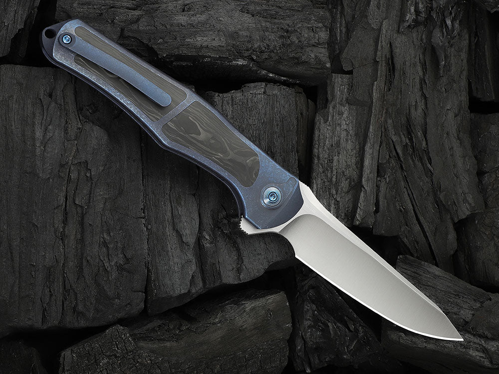 # ** HERE NOW ** - WE Knives - WE07B 702XI 11TH ANNIVERSARY KNIFE- 3.81 INCH M390 Blade - INTEGRAL Handle