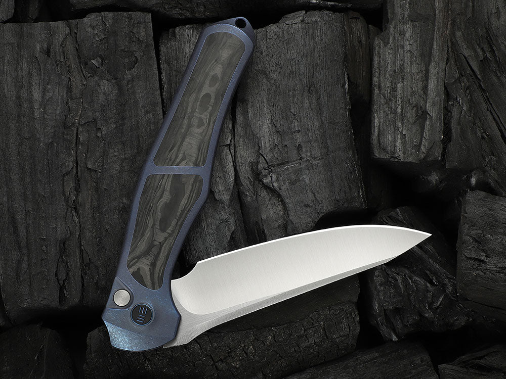 # ** HERE NOW ** - WE Knives - WE07B 702XI 11TH ANNIVERSARY KNIFE- 3.81 INCH M390 Blade - INTEGRAL Handle