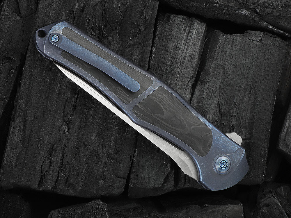 # ** HERE NOW ** - WE Knives - WE07B 702XI 11TH ANNIVERSARY KNIFE- 3.81 INCH M390 Blade - INTEGRAL Handle