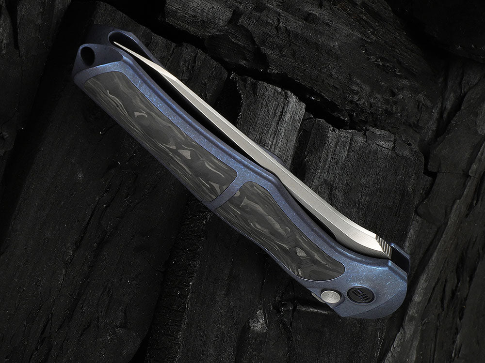 # ** HERE NOW ** - WE Knives - WE07B 702XI 11TH ANNIVERSARY KNIFE- 3.81 INCH M390 Blade - INTEGRAL Handle