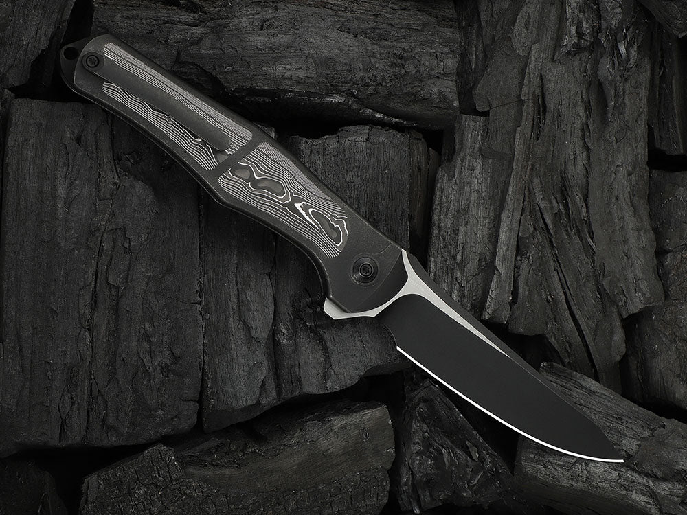 # ** HERE NOW ** - WE Knives - WE07B 702XI 11TH ANNIVERSARY KNIFE- 3.81 INCH M390 Blade - INTEGRAL Handle