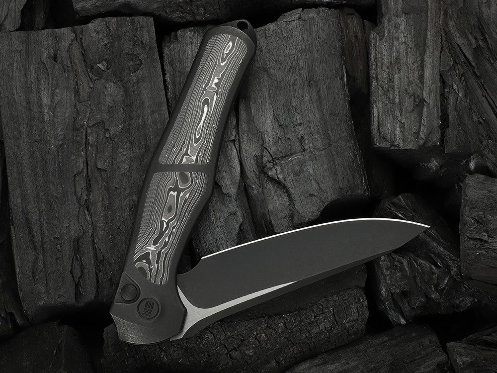 # ** HERE NOW ** - WE Knives - WE07B 702XI 11TH ANNIVERSARY KNIFE- 3.81 INCH M390 Blade - INTEGRAL Handle