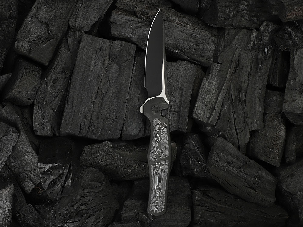 # ** HERE NOW ** - WE Knives - WE07B 702XI 11TH ANNIVERSARY KNIFE- 3.81 INCH M390 Blade - INTEGRAL Handle