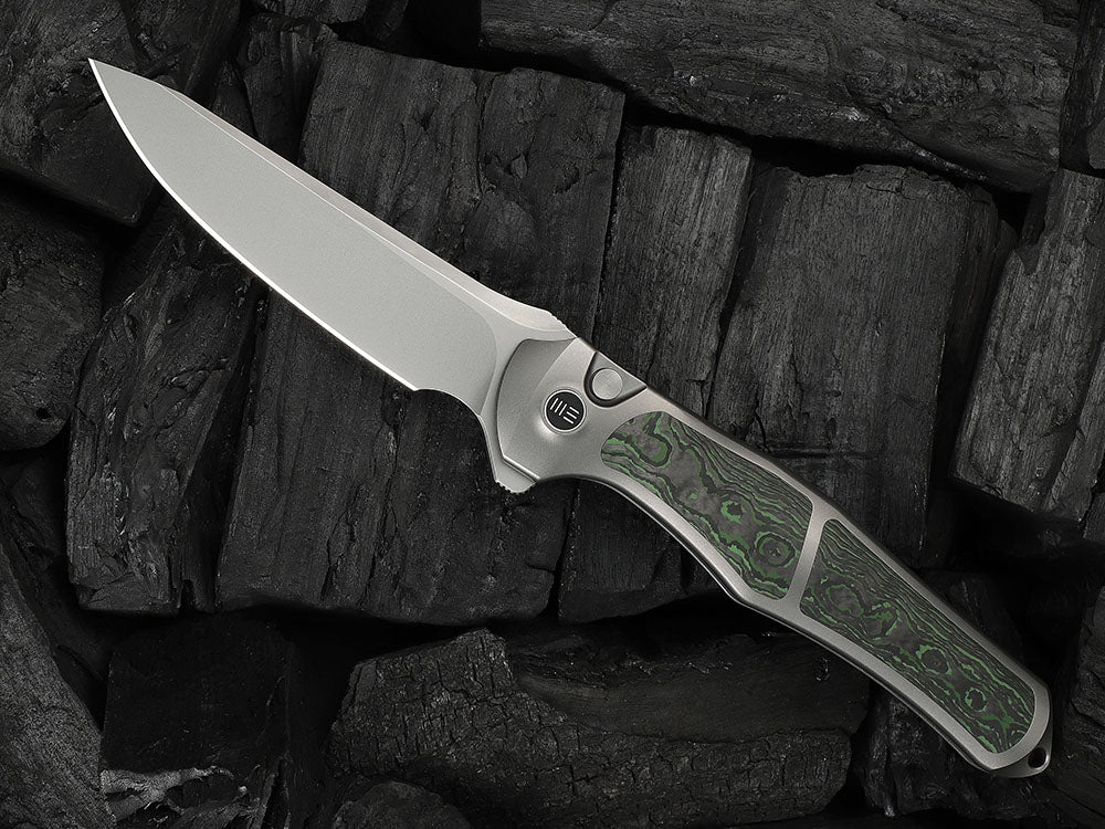 # ** HERE NOW ** - WE Knives - WE07B 702XI 11TH ANNIVERSARY KNIFE- 3.81 INCH M390 Blade - INTEGRAL Handle