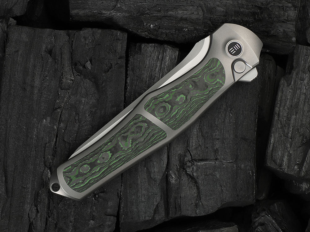# ** HERE NOW ** - WE Knives - WE07B 702XI 11TH ANNIVERSARY KNIFE- 3.81 INCH M390 Blade - INTEGRAL Handle