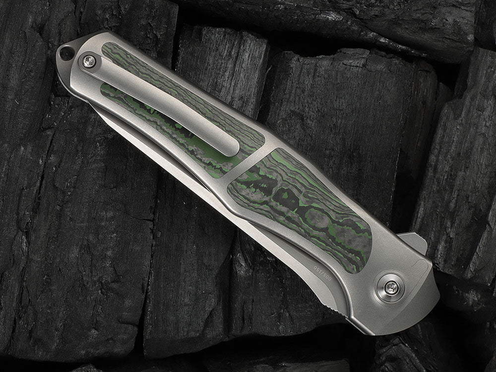 # ** HERE NOW ** - WE Knives - WE07B 702XI 11TH ANNIVERSARY KNIFE- 3.81 INCH M390 Blade - INTEGRAL Handle