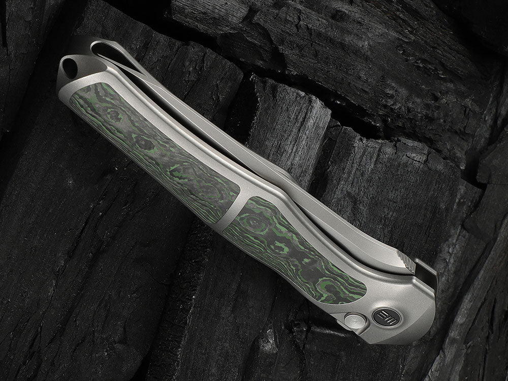 # ** HERE NOW ** - WE Knives - WE07B 702XI 11TH ANNIVERSARY KNIFE- 3.81 INCH M390 Blade - INTEGRAL Handle