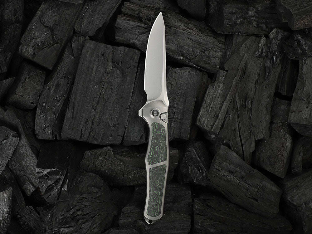 # ** HERE NOW ** - WE Knives - WE07B 702XI 11TH ANNIVERSARY KNIFE- 3.81 INCH M390 Blade - INTEGRAL Handle