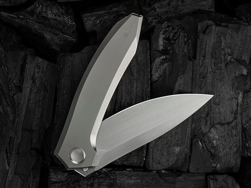 # ** HERE NOW ** - WE Knives - WE23070 ACCUMINAL - 3.98 INCH VANAX Blade - Titanium Handle