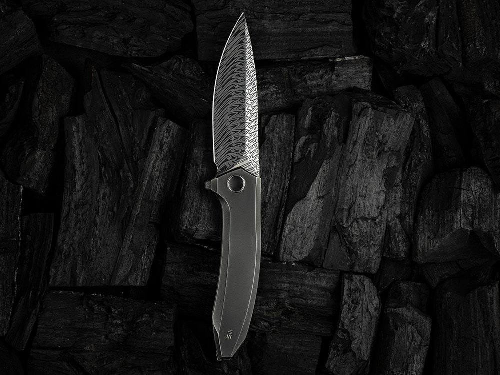 # ** HERE NOW ** - WE Knives - WE23070 ACCUMINAL - 3.98 INCH VANAX Blade - Titanium Handle