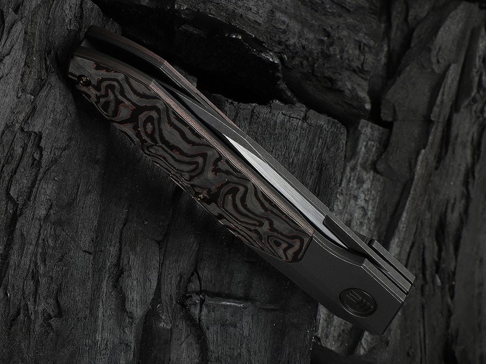 # ** HERE NOW ** - WE Knives - WE24007 Brr15 - 3.25 INCH M390 Blade - Titanium Handle - Rafal Brzeski