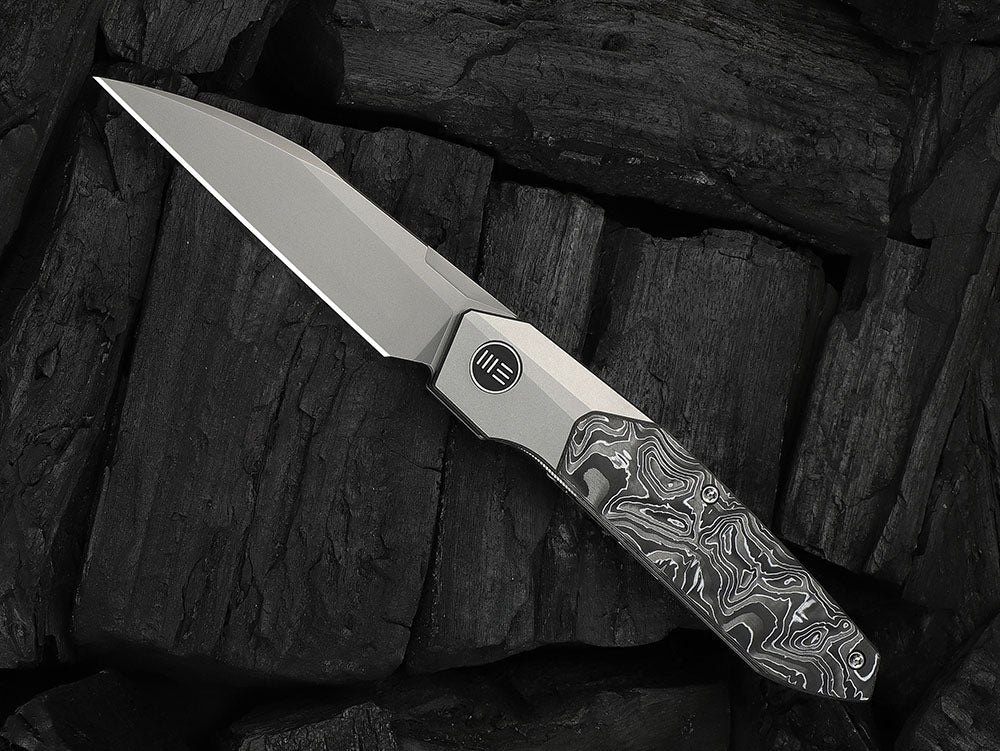 # ** HERE NOW ** - WE Knives - WE24007 Brr15 - 3.25 INCH M390 Blade - Titanium Handle - Rafal Brzeski