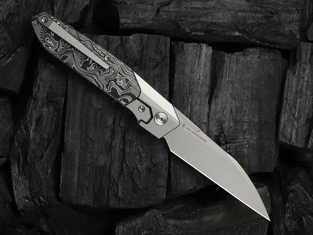 # ** HERE NOW ** - WE Knives - WE24007 Brr15 - 3.25 INCH M390 Blade - Titanium Handle - Rafal Brzeski