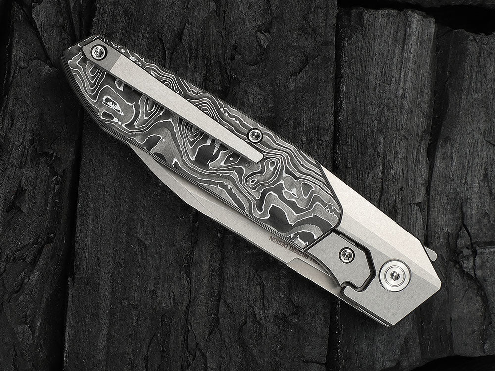 # ** HERE NOW ** - WE Knives - WE24007 Brr15 - 3.25 INCH M390 Blade - Titanium Handle - Rafal Brzeski