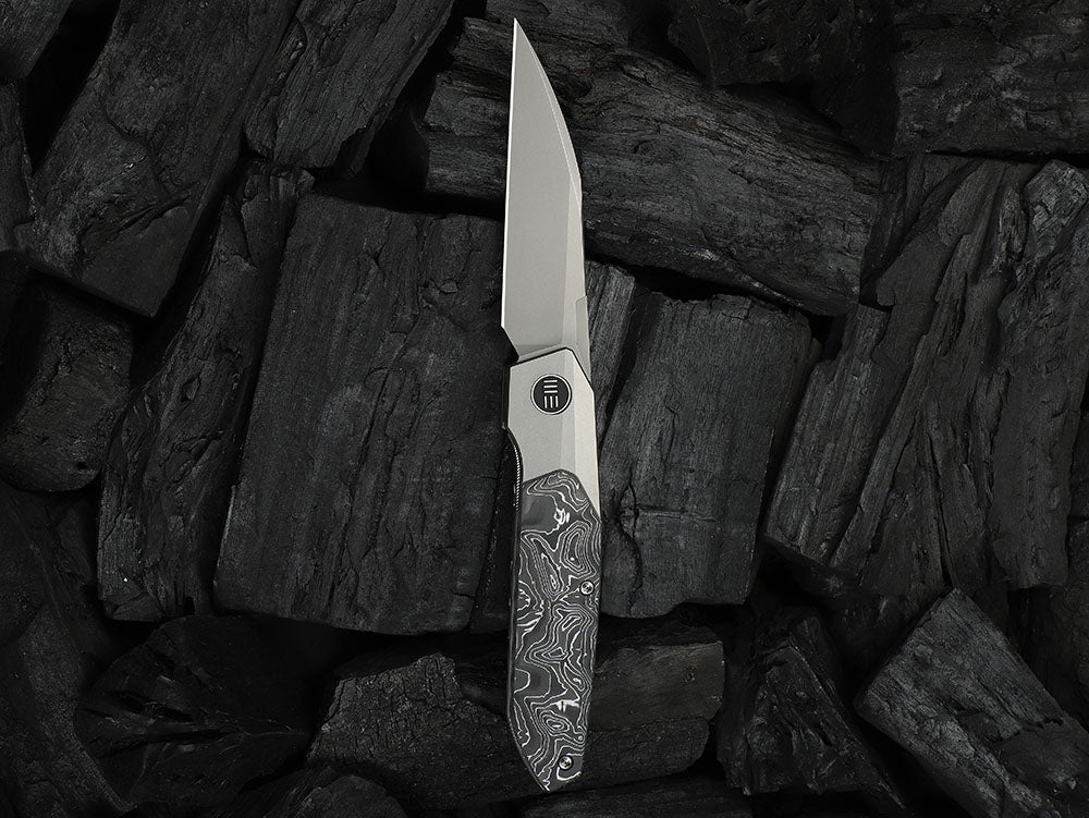 # ** HERE NOW ** - WE Knives - WE24007 Brr15 - 3.25 INCH M390 Blade - Titanium Handle - Rafal Brzeski