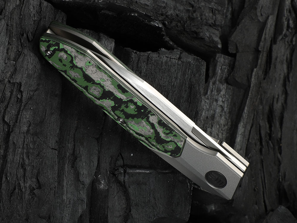 # ** HERE NOW ** - WE Knives - WE24007 Brr15 - 3.25 INCH M390 Blade - Titanium Handle - Rafal Brzeski