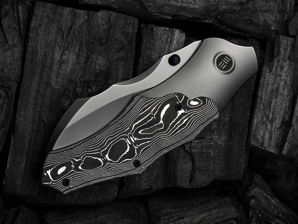 # ** HERE NOW ** - WE Knives - WE24042 ORC BOSS - 3.82 INCH 20CV Blade - Titanium Handle - Grant Chambers Design
