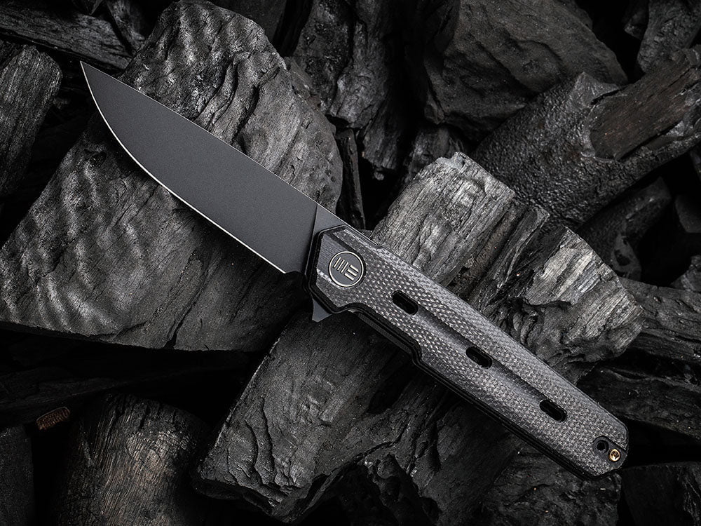 # ** HERE NOW ** WE Knife - WE22026 NAVO - 20CV Blade - Titanium Handle - OSTAP HEL DESIGN - True Talon