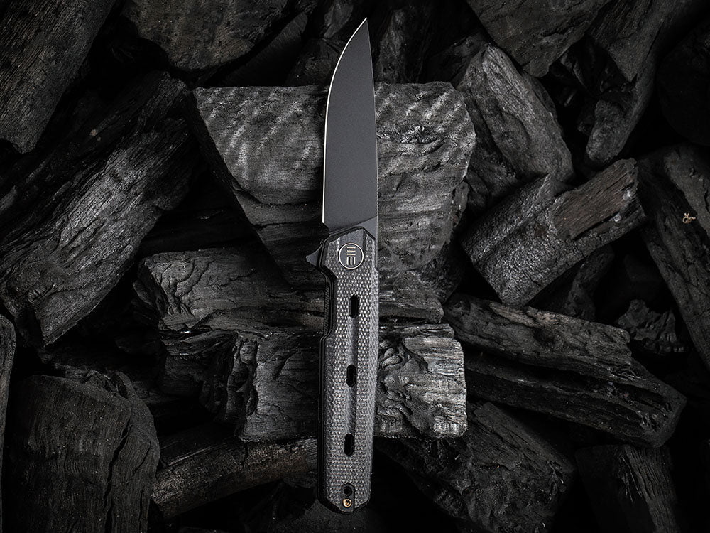 # ** HERE NOW ** WE Knife - WE22026 NAVO - 20CV Blade - Titanium Handle - OSTAP HEL DESIGN - True Talon