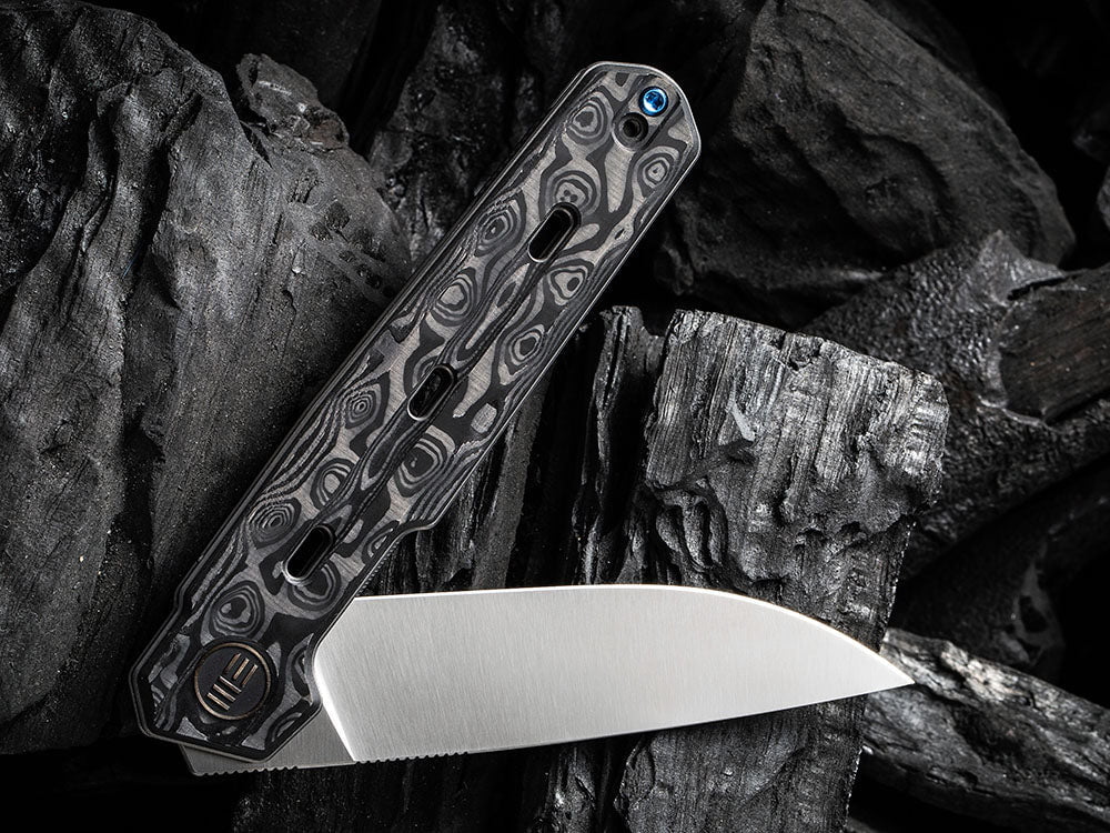 # ** HERE NOW ** WE Knife - WE22026 NAVO - 20CV Blade - Titanium Handle - OSTAP HEL DESIGN - True Talon