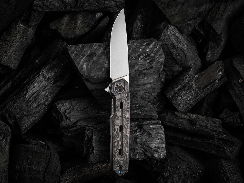 # ** HERE NOW ** WE Knife - WE22026 NAVO - 20CV Blade - Titanium Handle - OSTAP HEL DESIGN - True Talon