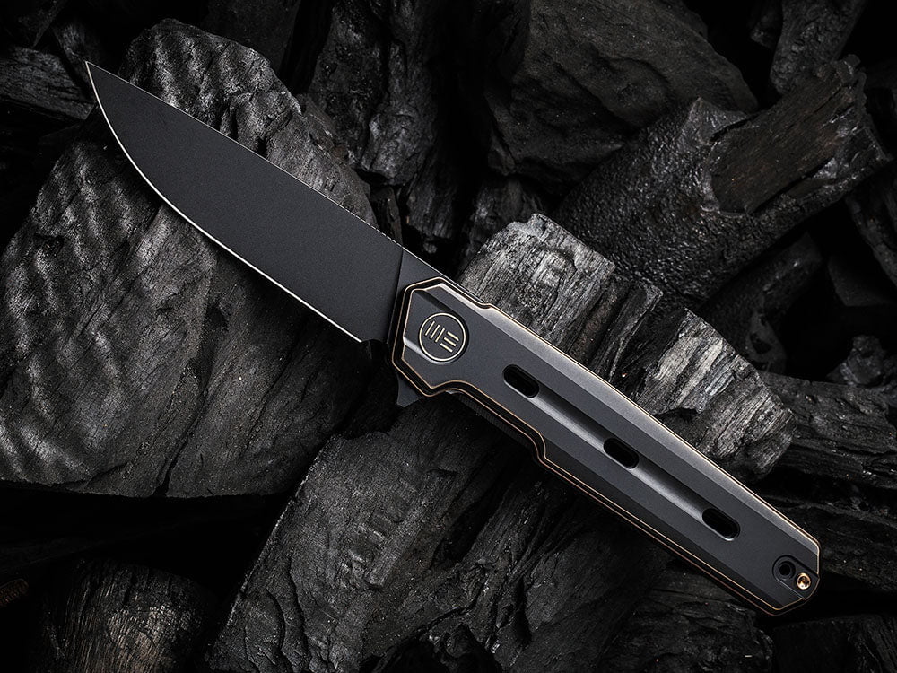# ** HERE NOW ** WE Knife - WE22026 NAVO - 20CV Blade - Titanium Handle - OSTAP HEL DESIGN - True Talon