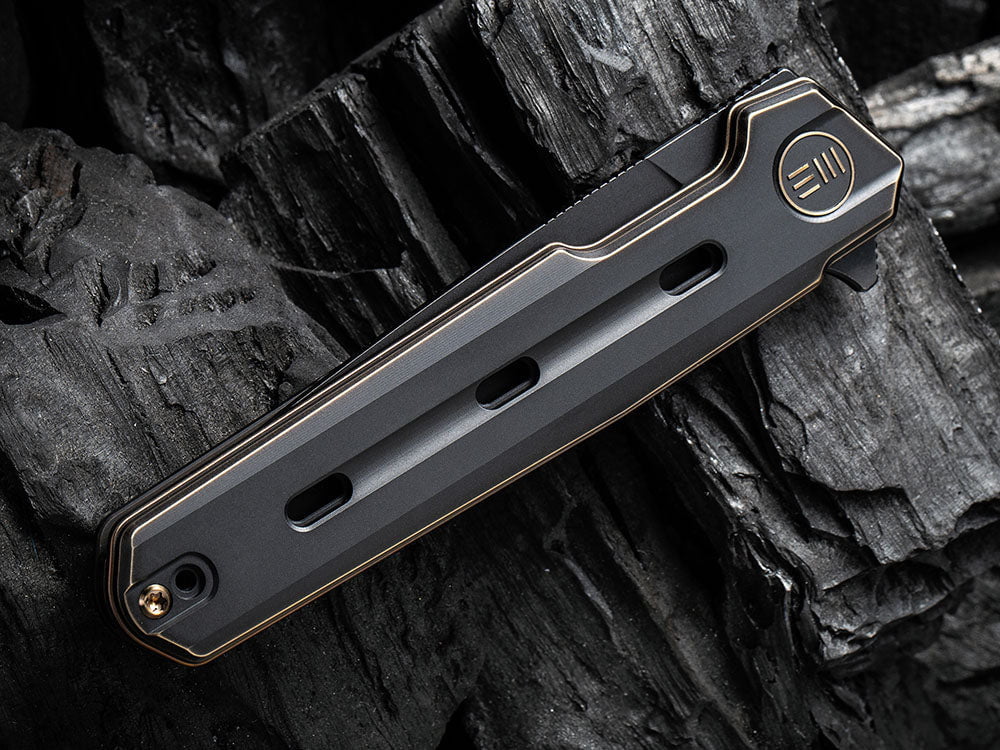 # ** HERE NOW ** WE Knife - WE22026 NAVO - 20CV Blade - Titanium Handle - OSTAP HEL DESIGN - True Talon