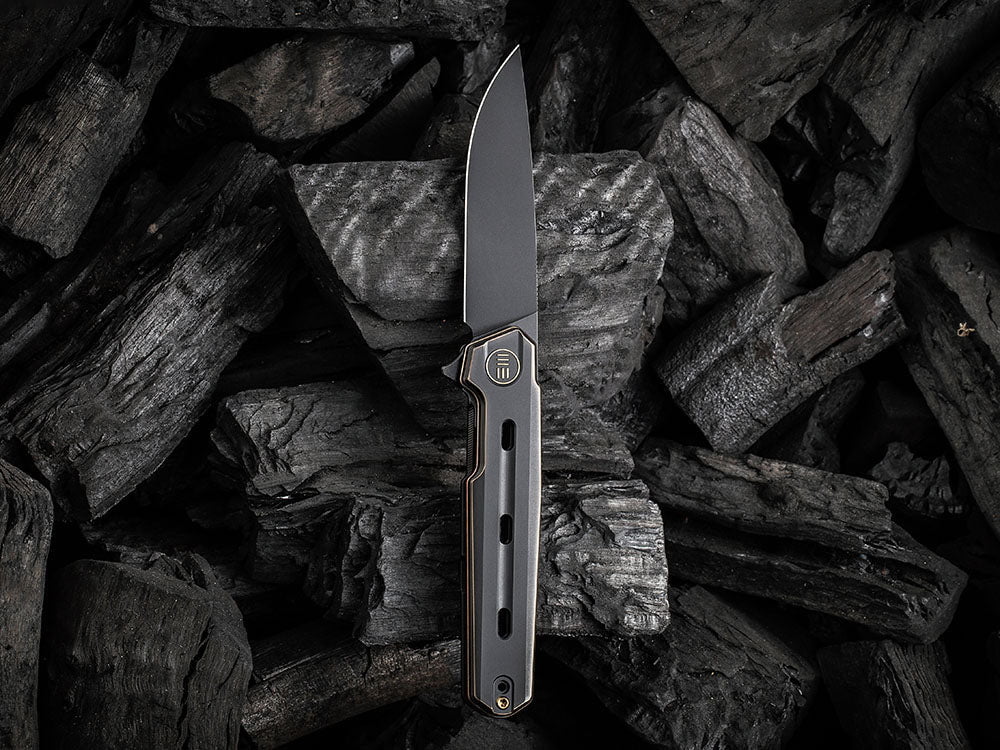 # ** HERE NOW ** WE Knife - WE22026 NAVO - 20CV Blade - Titanium Handle - OSTAP HEL DESIGN - True Talon