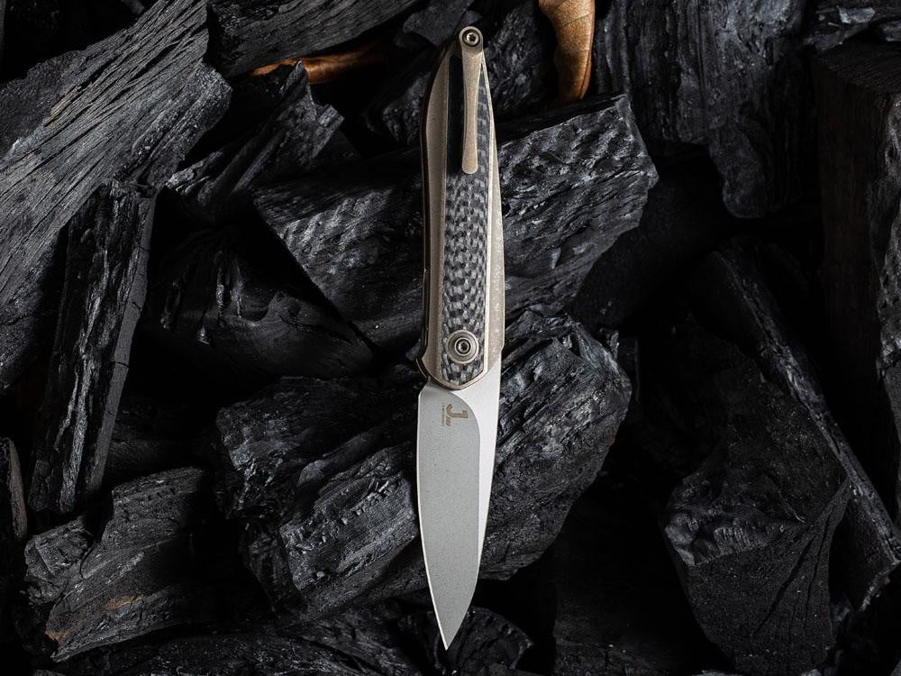 ** HERE NOW ** - WE KNIVES - 2010 BLACK VOID OPUS- 20CV Blade - Front Flipper - True Talon