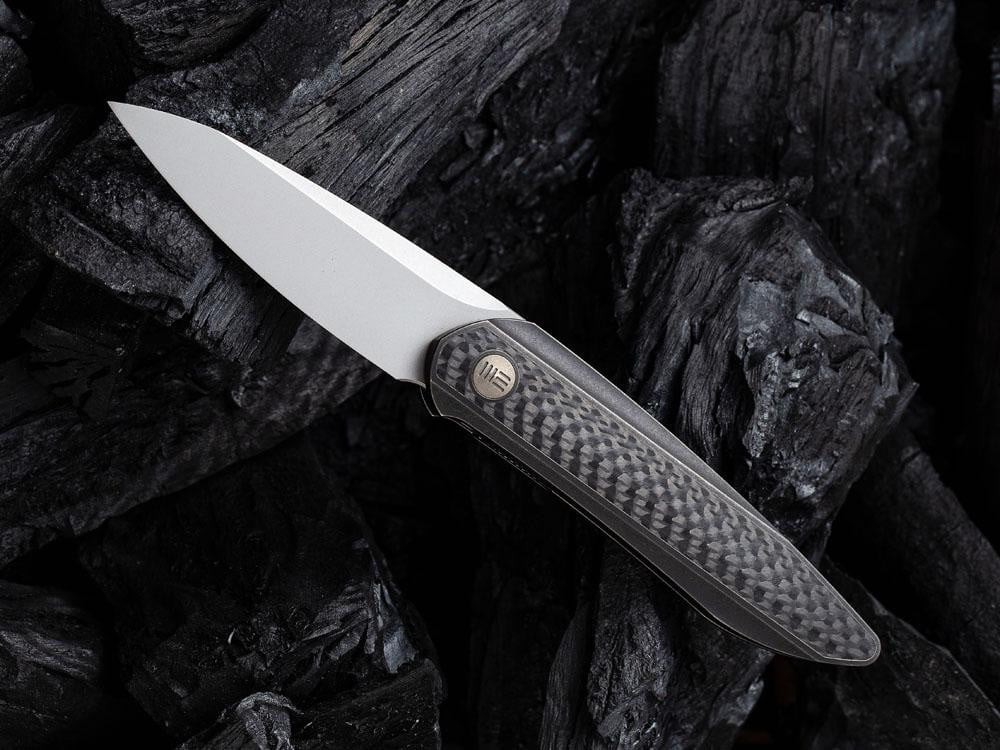 ** HERE NOW ** - WE KNIVES - 2010 BLACK VOID OPUS- 20CV Blade - Front Flipper - True Talon