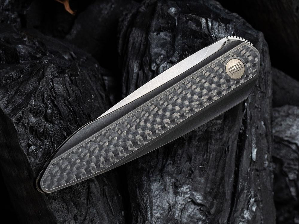 ** HERE NOW ** - WE KNIVES - 2010 BLACK VOID OPUS- 20CV Blade - Front Flipper - True Talon