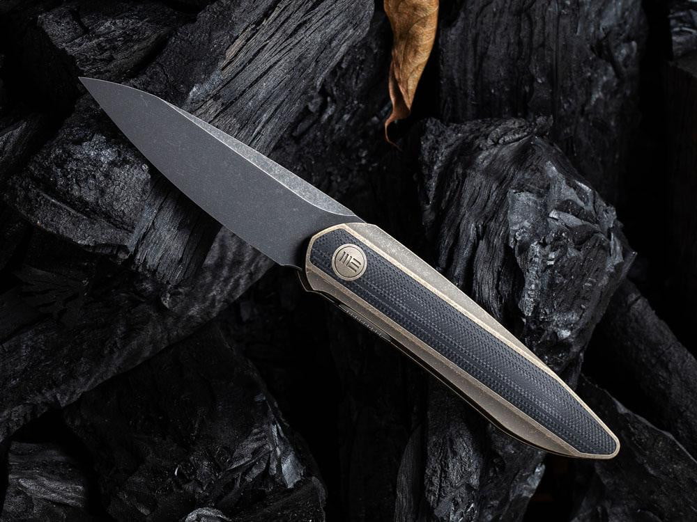 ** HERE NOW ** - WE KNIVES - 2010 BLACK VOID OPUS- 20CV Blade - Front Flipper - True Talon