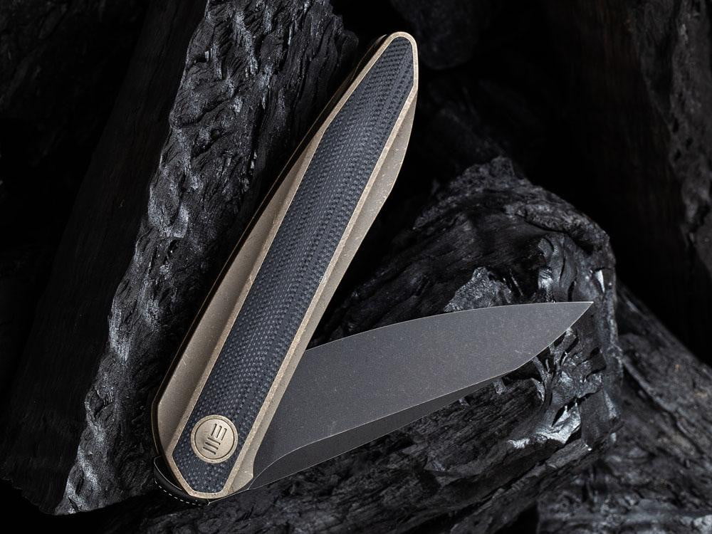 ** HERE NOW ** - WE KNIVES - 2010 BLACK VOID OPUS- 20CV Blade - Front Flipper - True Talon