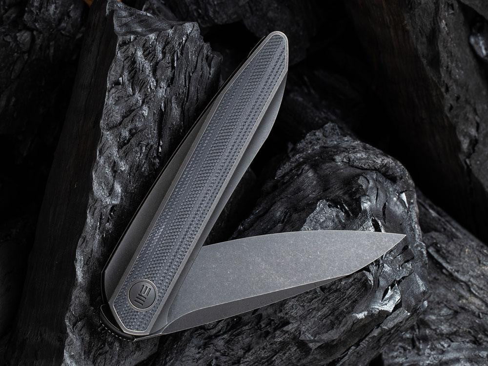 ** HERE NOW ** - WE KNIVES - 2010 BLACK VOID OPUS- 20CV Blade - Front Flipper - True Talon