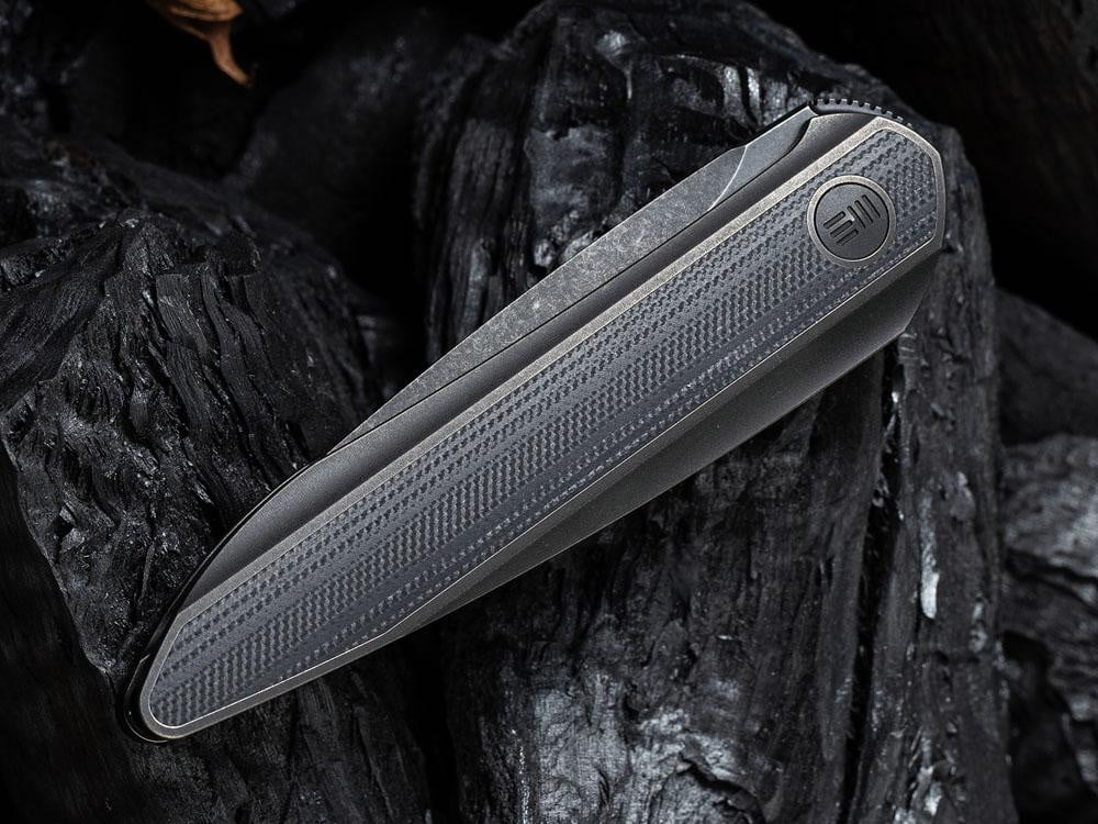 ** HERE NOW ** - WE KNIVES - 2010 BLACK VOID OPUS- 20CV Blade - Front Flipper - True Talon