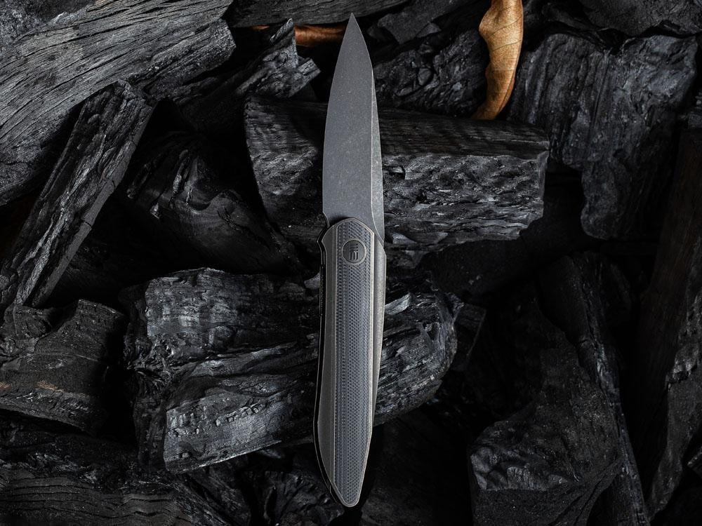 ** HERE NOW ** - WE KNIVES - 2010 BLACK VOID OPUS- 20CV Blade - Front Flipper - True Talon