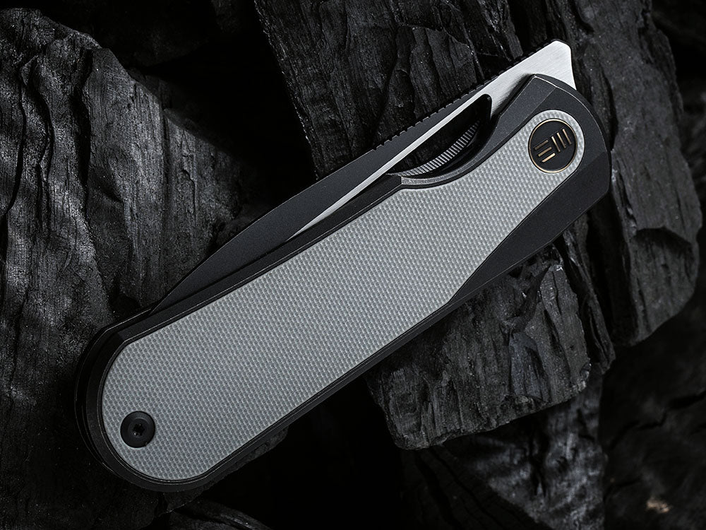 # ** HERE NOW ** WE Knife WE-WE21033 - BALOO - 20CV or Damasteel Blade - CARBON FIBER HANDLE - OSTAP HEL DESIGN