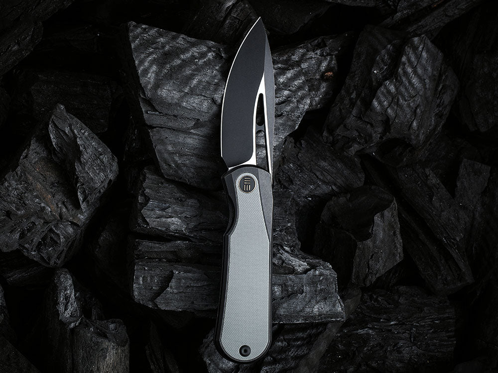 # ** HERE NOW ** WE Knife WE-WE21033 - BALOO - 20CV or Damasteel Blade - CARBON FIBER HANDLE - OSTAP HEL DESIGN