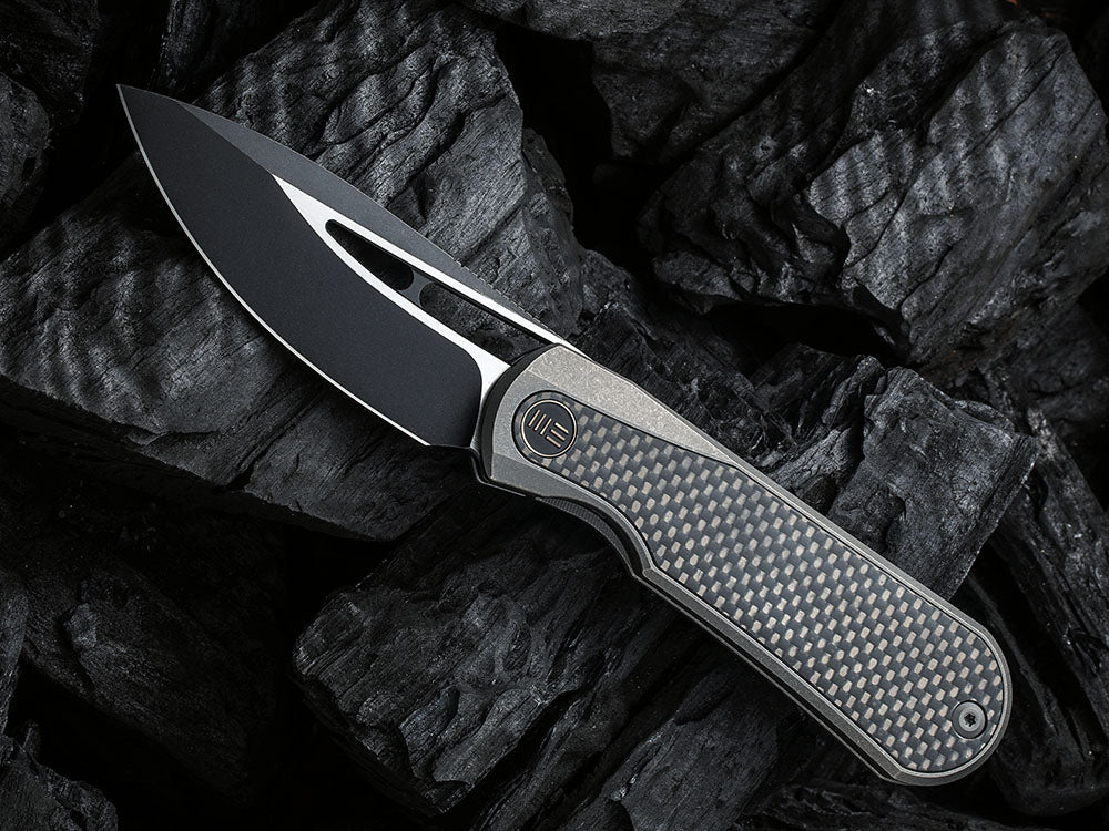 # ** HERE NOW ** WE Knife WE-WE21033 - BALOO - 20CV or Damasteel Blade - CARBON FIBER HANDLE - OSTAP HEL DESIGN