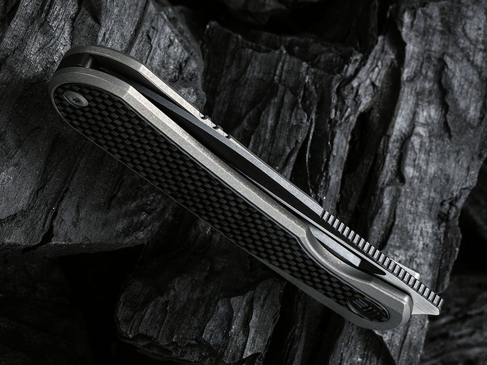# ** HERE NOW ** WE Knife WE-WE21033 - BALOO - 20CV or Damasteel Blade - CARBON FIBER HANDLE - OSTAP HEL DESIGN