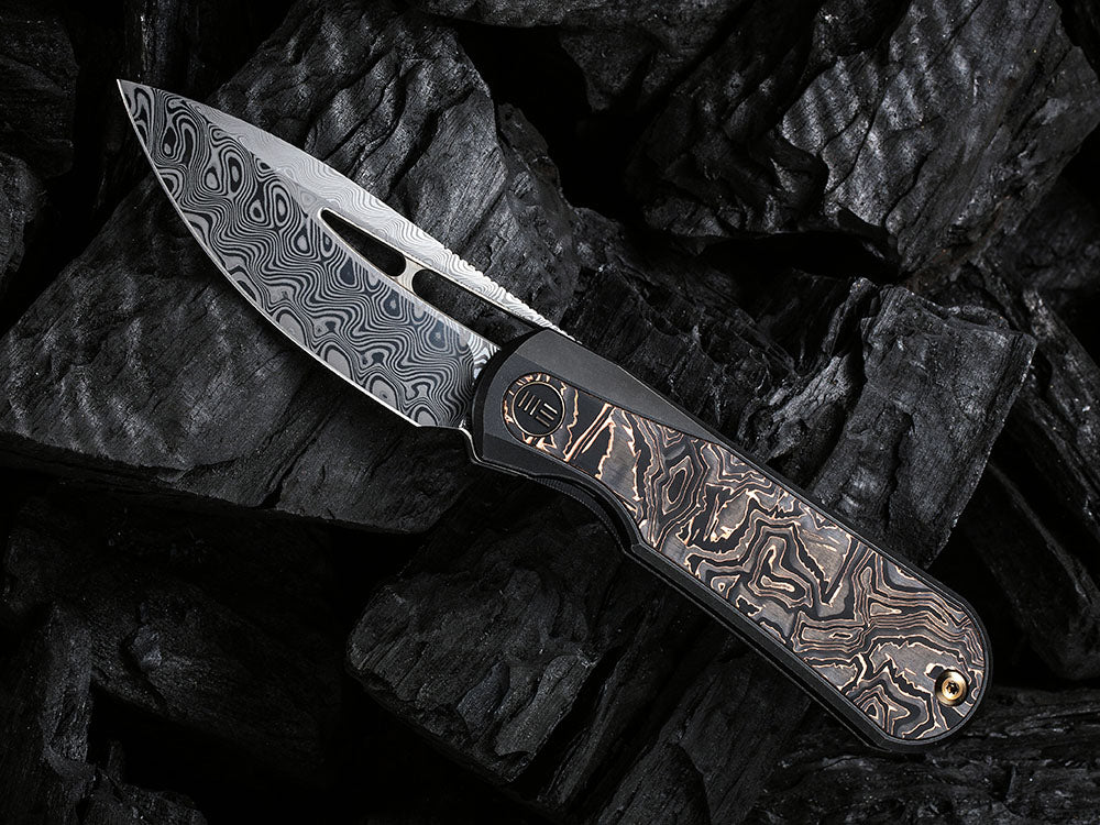 # ** HERE NOW ** WE Knife WE-WE21033 - BALOO - 20CV or Damasteel Blade - CARBON FIBER HANDLE - OSTAP HEL DESIGN