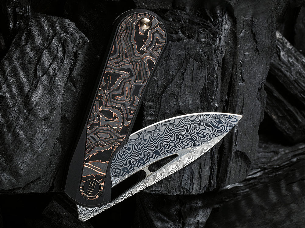 # ** HERE NOW ** WE Knife WE-WE21033 - BALOO - 20CV or Damasteel Blade - CARBON FIBER HANDLE - OSTAP HEL DESIGN