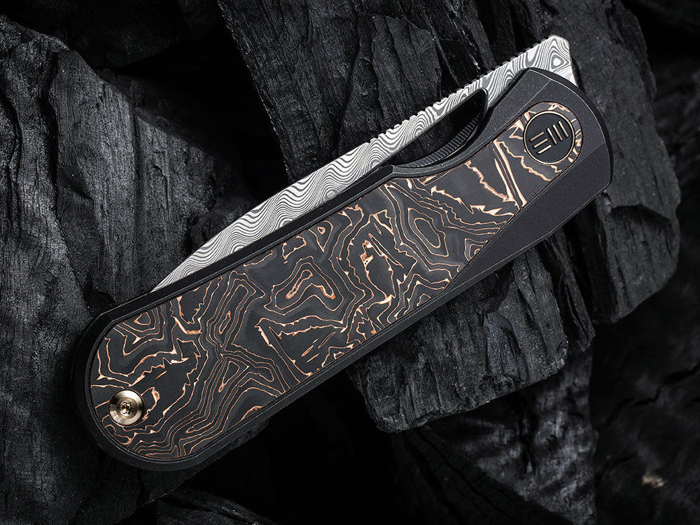 # ** HERE NOW ** WE Knife WE-WE21033 - BALOO - 20CV or Damasteel Blade - CARBON FIBER HANDLE - OSTAP HEL DESIGN