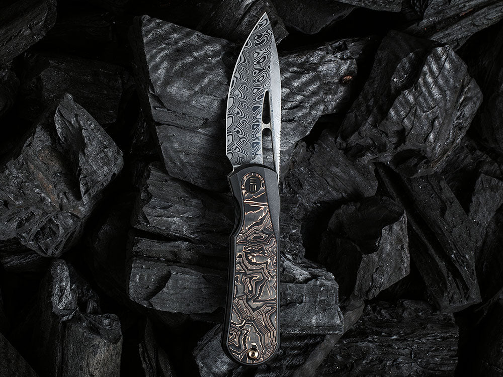 # ** HERE NOW ** WE Knife WE-WE21033 - BALOO - 20CV or Damasteel Blade - CARBON FIBER HANDLE - OSTAP HEL DESIGN
