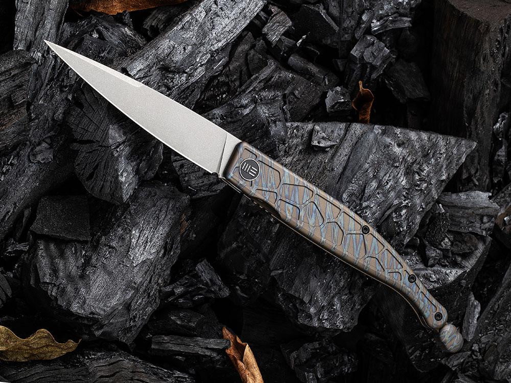 ** HERE NOW ** - WE KNIVES - 2008 ROMAN - S35VN Blade - Titanium Handle - Front Flipper - True Talon