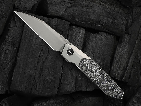 # ** HERE NOW ** - WE Knives - WE24007 Brr15 -  3.25 INCH M390 Blade - Titanium Handle - Rafal Brzeski