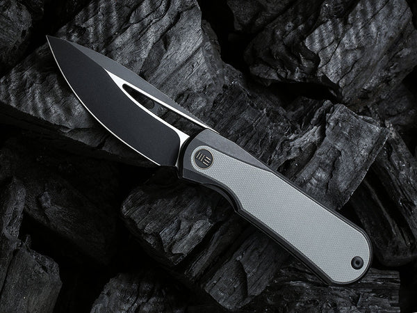 # ** HERE NOW ** WE Knife WE-WE21033 - BALOO - 20CV or Damasteel Blade - CARBON FIBER HANDLE - OSTAP HEL DESIGN